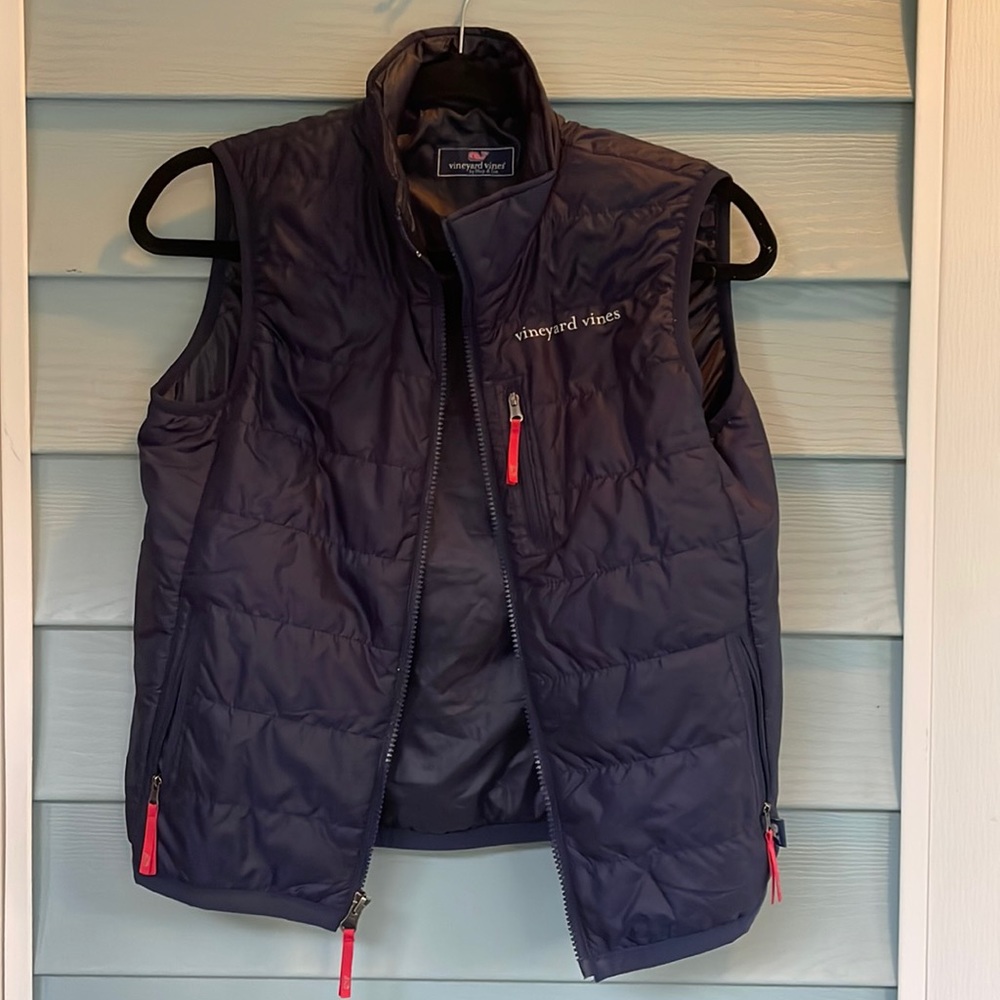Size medium unisex navy blue vest.